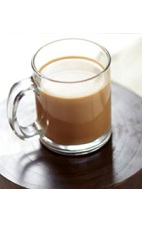 The Bailey's Hazelnut Coffee is a brown colored drink made from Bailey's Hazelnut Irish cream, coffee and whipped cream, and served in a warm coffee glass.
