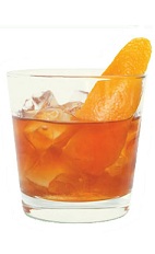 The Elderfashioned Traditional is an orange colored drink made from bourbon, St-Germain elderflower liqueur and bitters, and served over ice in an old-fashioned glass.