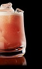 The Jam Sour drink recipe is made from Monkey Shoulder scotch, simple syrup, raspberry jam, lemon juice, club soda and orange bitters, and served over ice in a rocks glass.