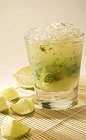 The Mint Caipirinha cocktail recipe is made from Leblon Cachaca, mint, lime juice and sugar, and served over crushed ice in a rocks glass.