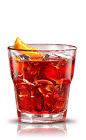 The Negroni is a classic drink made from Campari, gin and sweet vermouth, and served with an orange slice over ice in a rocks glass.