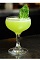 The Basil Gimlet cocktail recipe is a green colored drink made from VeeV acai spirit, basil juice and simple syrup, and served in a chilled cocktail glass.