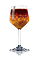 The Brazilian Sangria cocktail recipe is made from Lucid absinthe, cachaca, brandy, orange liqueur, red wine, orange, apple and lemon, and served in a chilled wine glass.